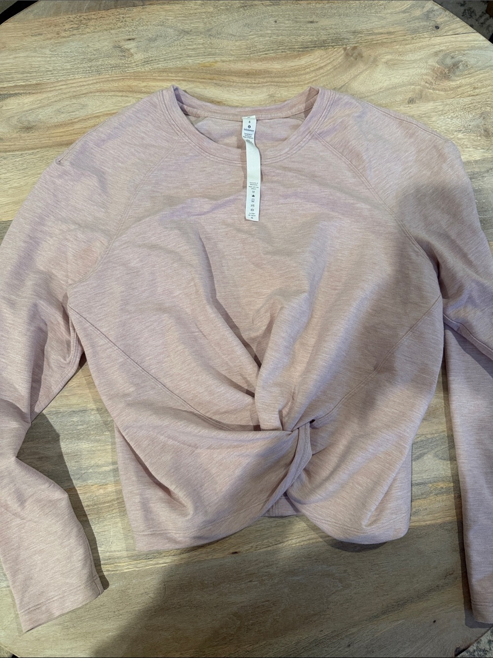 Pale pink Lululemon slight cropped long sleeve